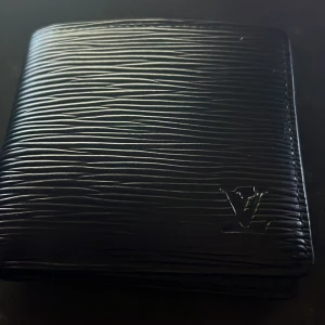 Louis vuitton - Plånboken är stilren och i nyskick, läder och ingen skada