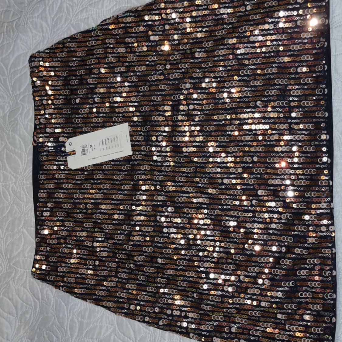 Glittrig paljettkjol, st S