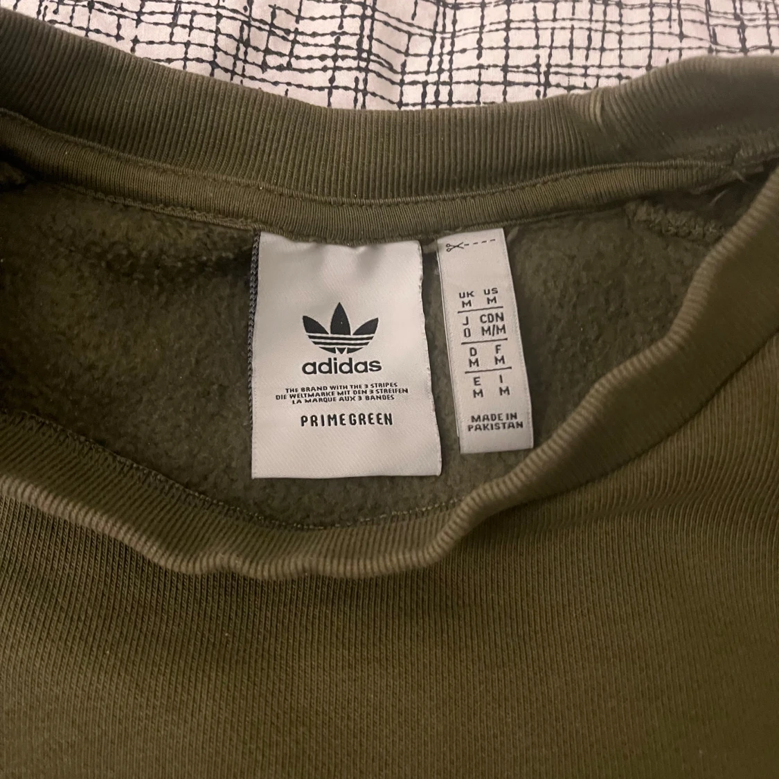 Olivgrön sweatshirt från Adidas - 2