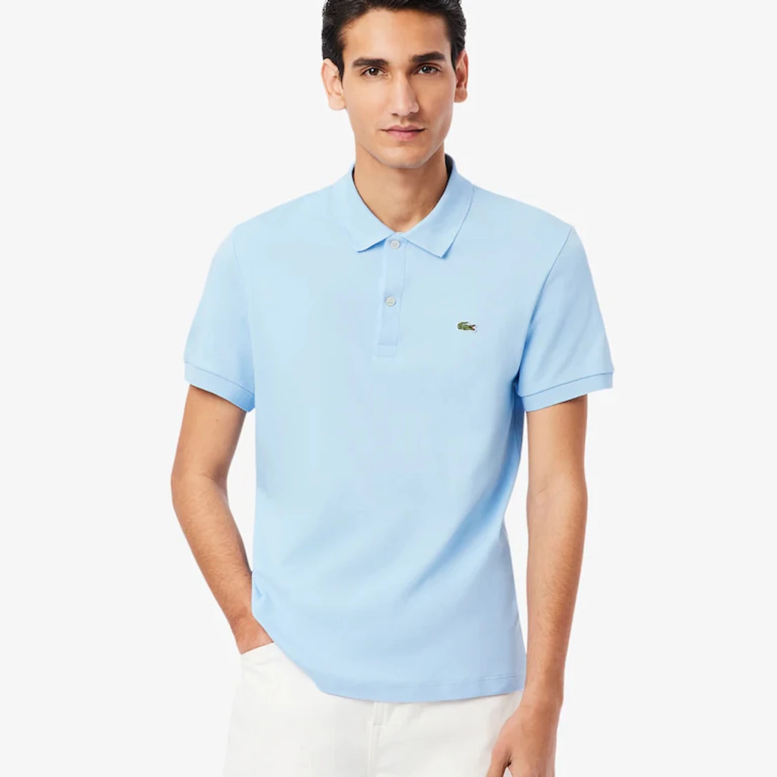 Ljusblå pikétröja från Lacoste - 1