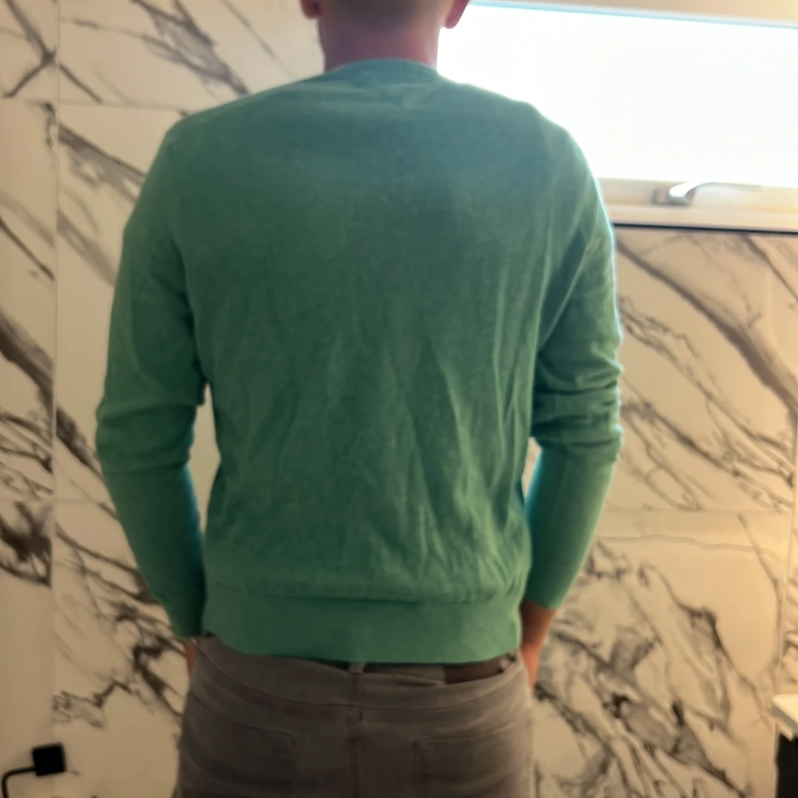 Grön v-ringad tröja Tommy Hilfiger - 1