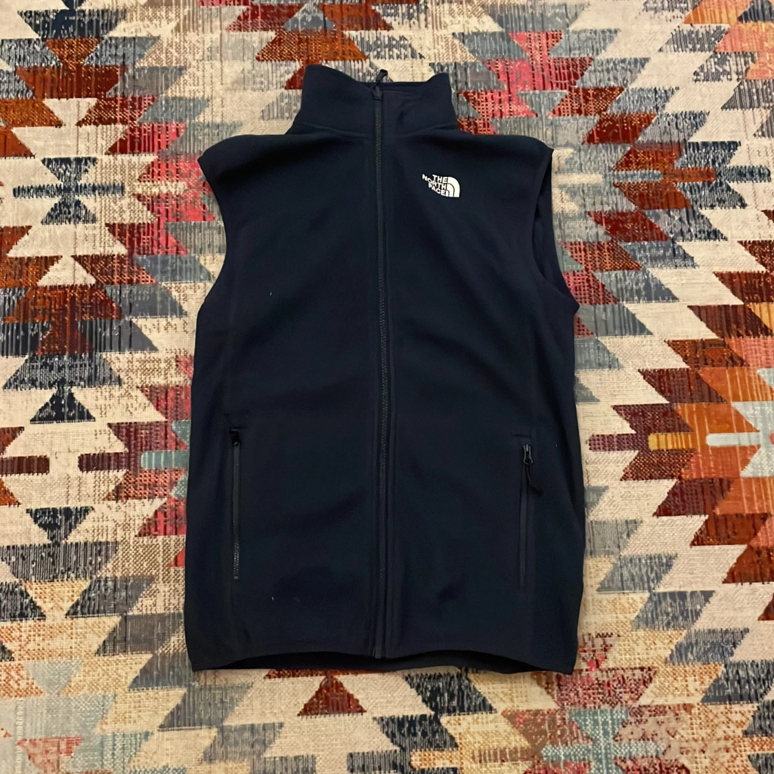 Mörkblå fleeceväst från The North Face XS