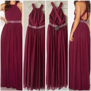 Festklänning - Ny festklänning från Goddiva London – storlek L/40 Helt ny och oanvänd, med prislapp kvar (utan pris). Snygg vinröd färg (burgundy), perfekt för fest och tillställningar. Storlek L / 40 – i toppskick. 