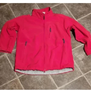 Didriksons vindjacka - Röd vindjacka med hel dragkedja framtill, höga fickor med dragkedja och ståkrage. Storlek S.