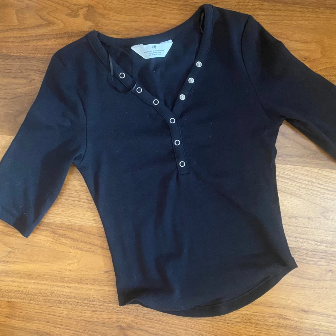 Topp med knappar - 2