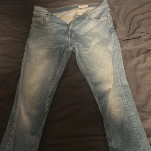 Blå jeans från Tiger of Sweden - Använda, storlek 30/30