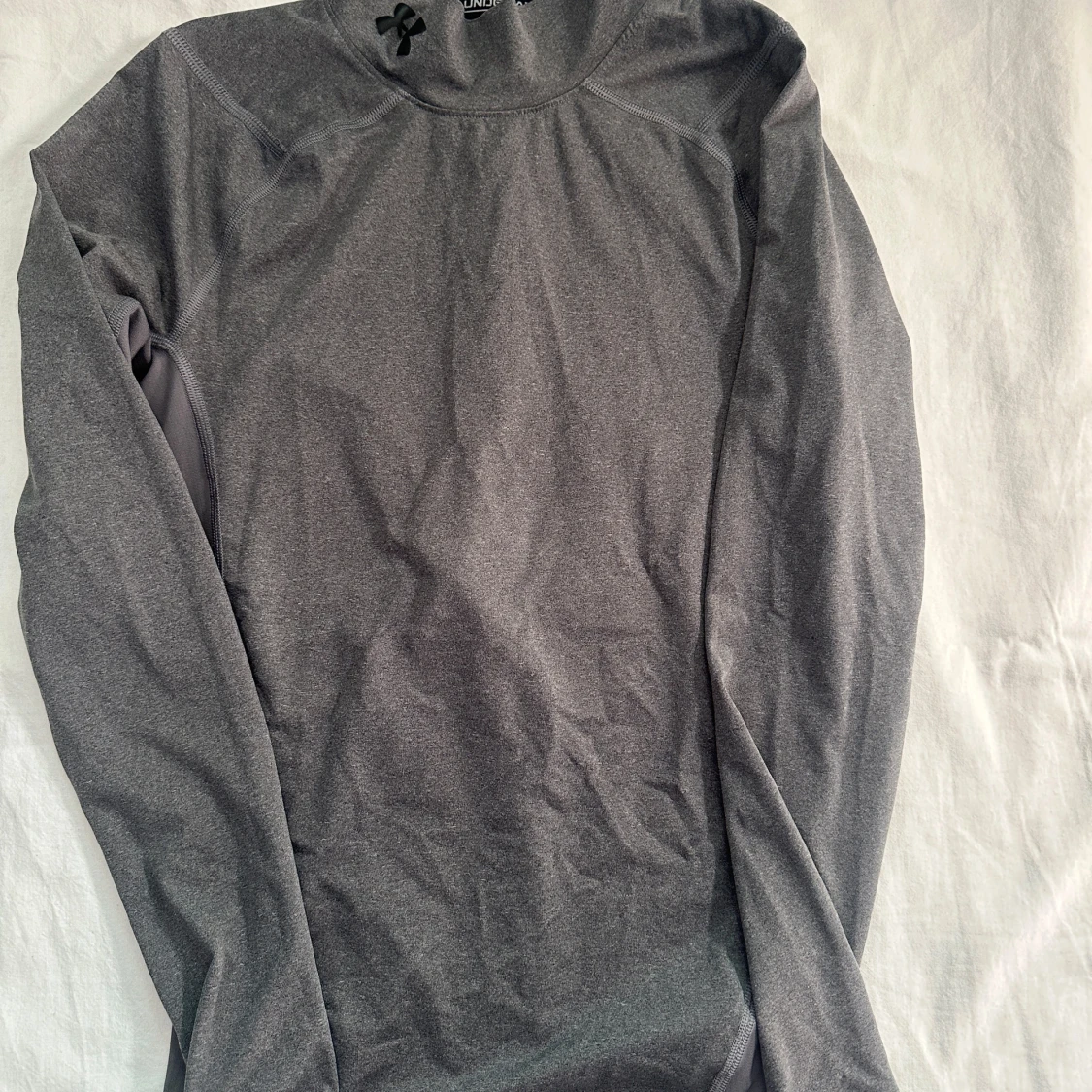 Grå långärmad träningströja Under Armour