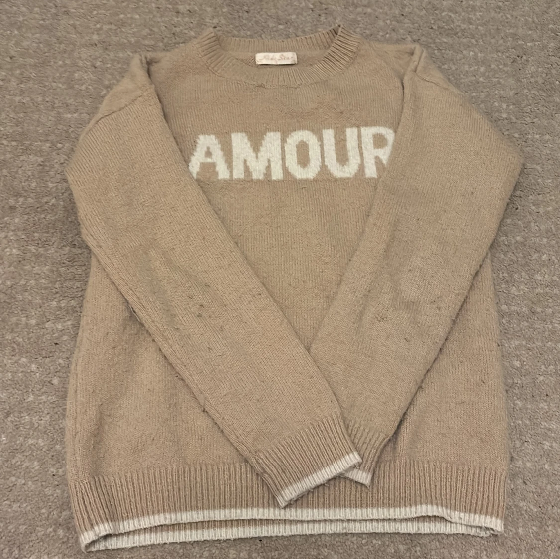 Beige stickad tröja från Kids Star