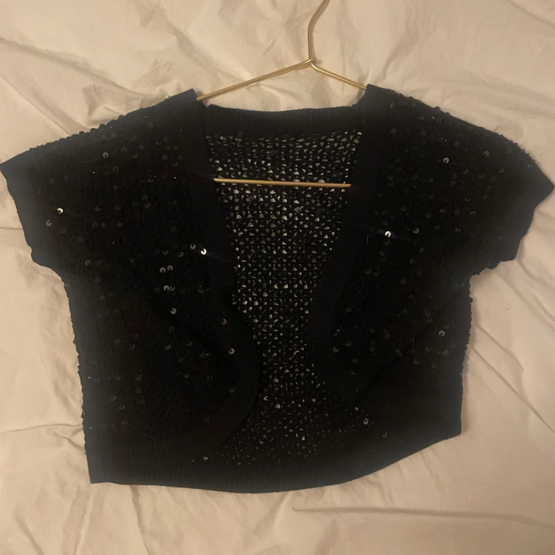 Svart bolerotopp med paljetter