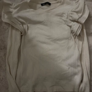 Volang blus  - Lite nopprig 