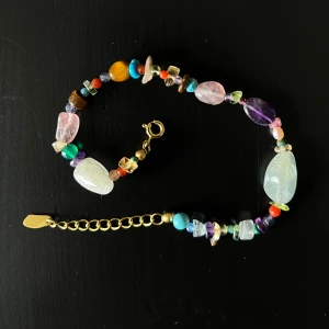 Sten armband guld Maanesten  - Ett 18k guldtpläterat armband från Maansten. Också i nytt skick, aldrig använt. Maansten smycken kostar annars ny pris från 500-3000kr.