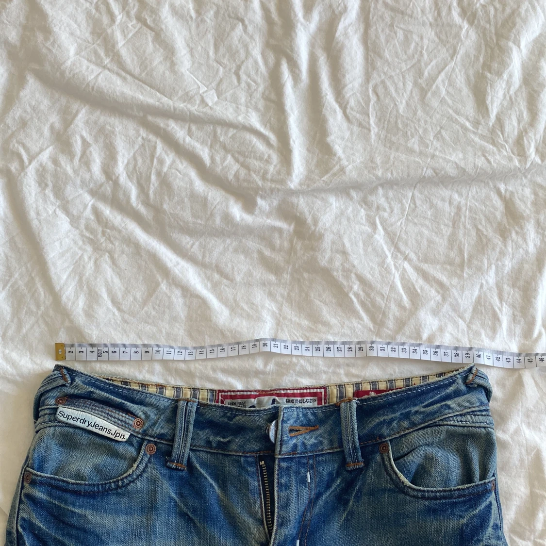 Blå bootcut jeans från Superdry - 4