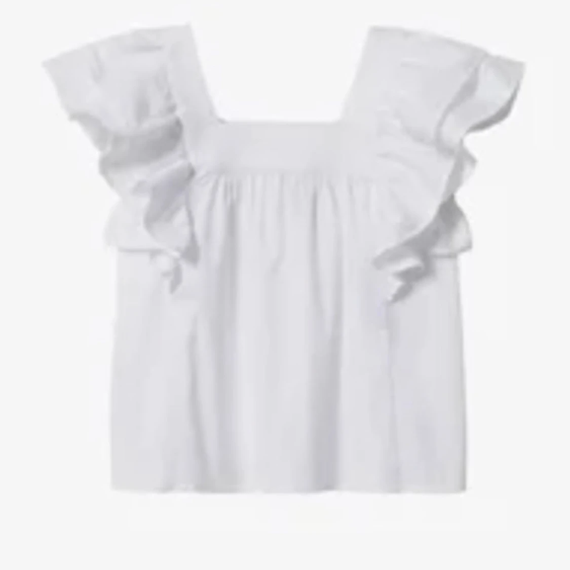 Vit blus med volanger  från MNG - 1