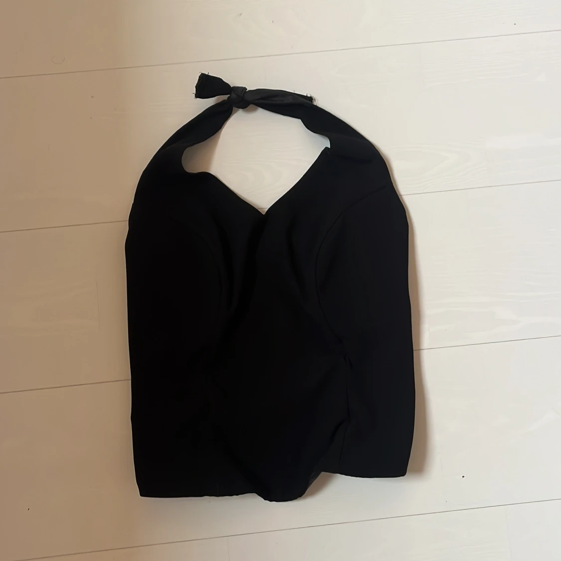 Svart halterneck korsett-topp