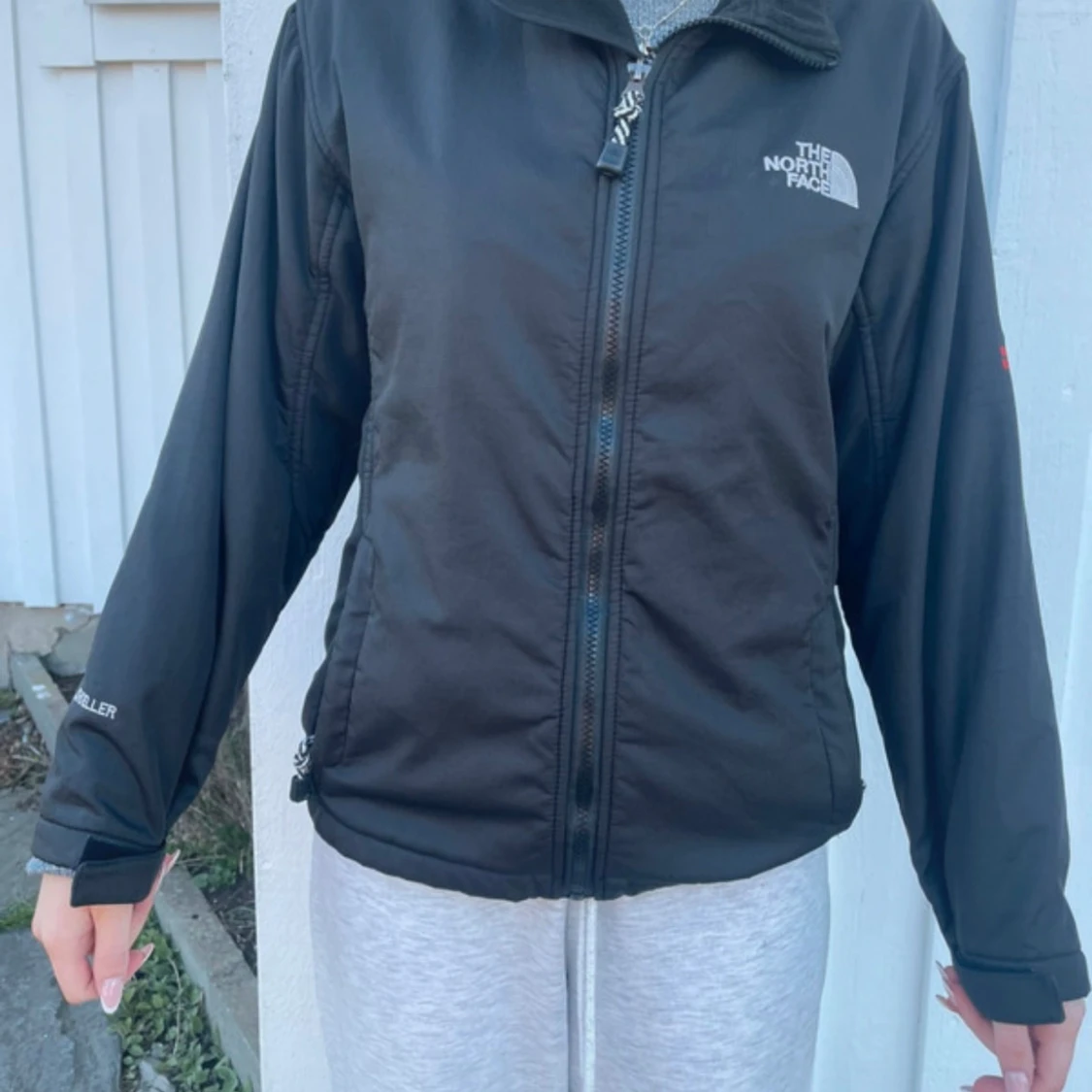 Svart jacka från The North Face Summit Series