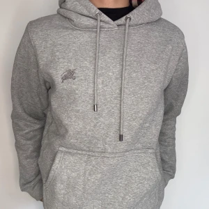 Grå tröja med rutig insida - Helt ny och oanvänd