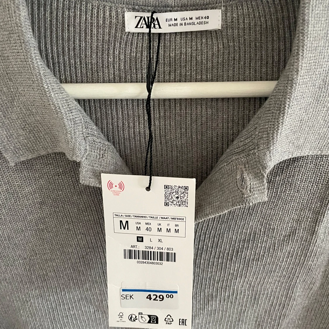 Grå ribbad pikétröja från Zara. Oanvänd, tagg på. - 1