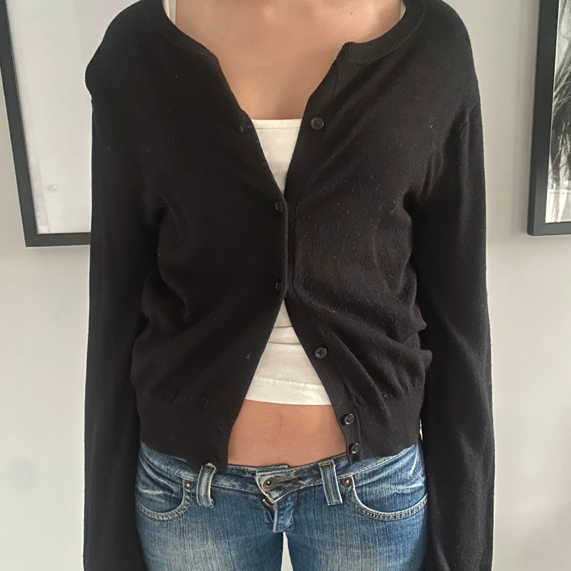 Svart kofta med knappar