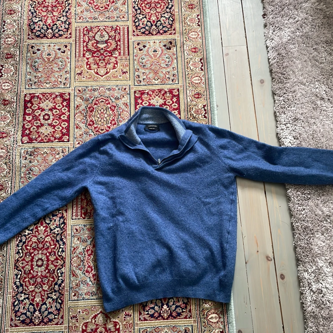 Blå halvzip-tröja från Cortefiel