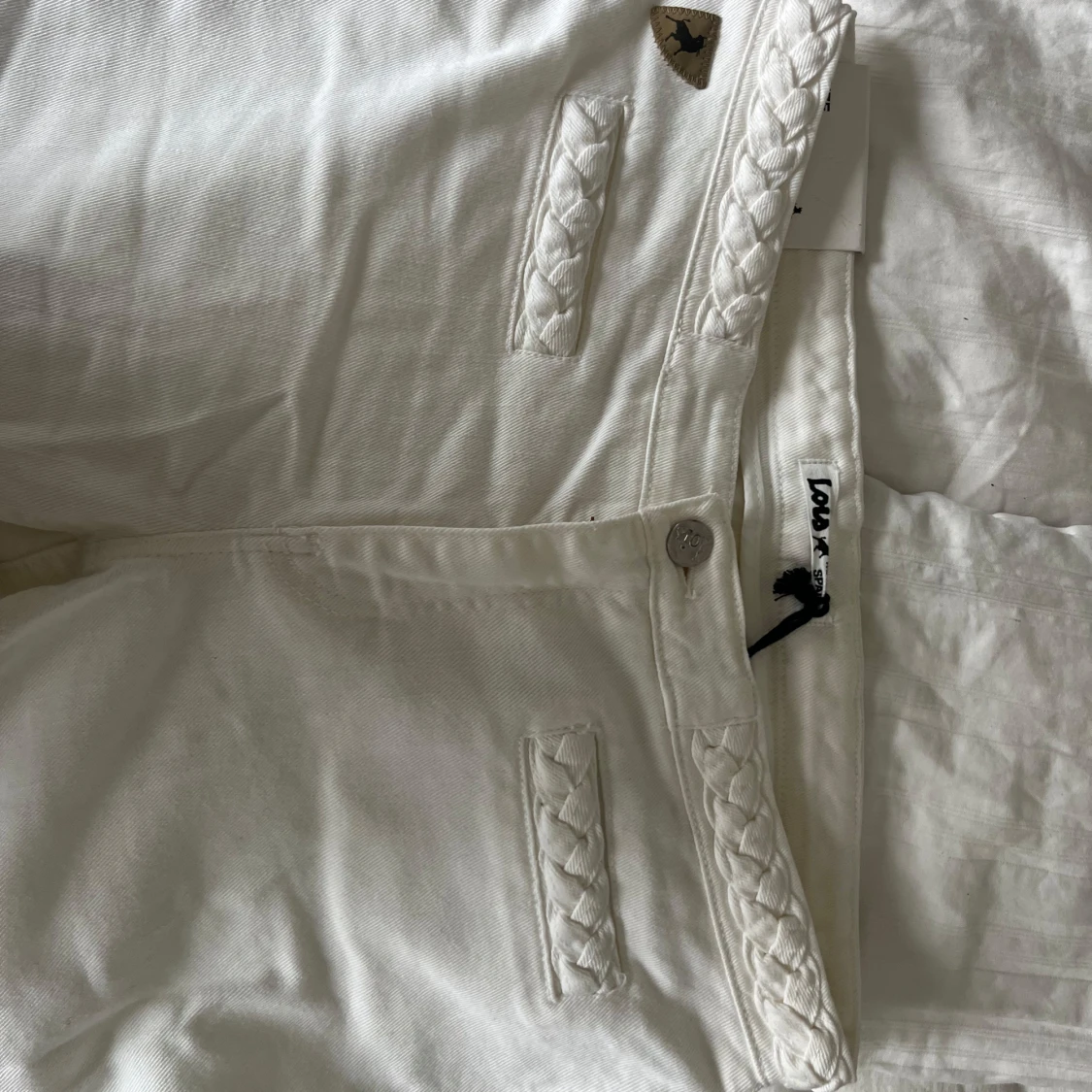Vita Lois jeans med flätade detaljer - 1