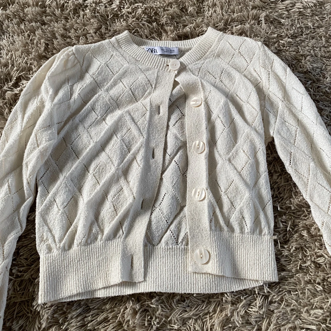 Beige mönstrad kofta - 90