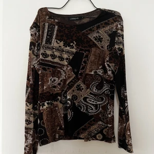 mesh tröja - brun tröja med två mesh lager (inte på armarna). !jag visar inte kläder på<3!