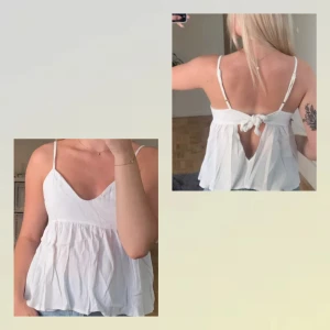 Vitt linne - vit topp/knyttopp från Brandy Melville - Vit topp med knytning i ryggen, från Brandy Melville. One size. Sparsamt använd. Tyvärr inte steamad på bilderna. Första bilden är lånad. 