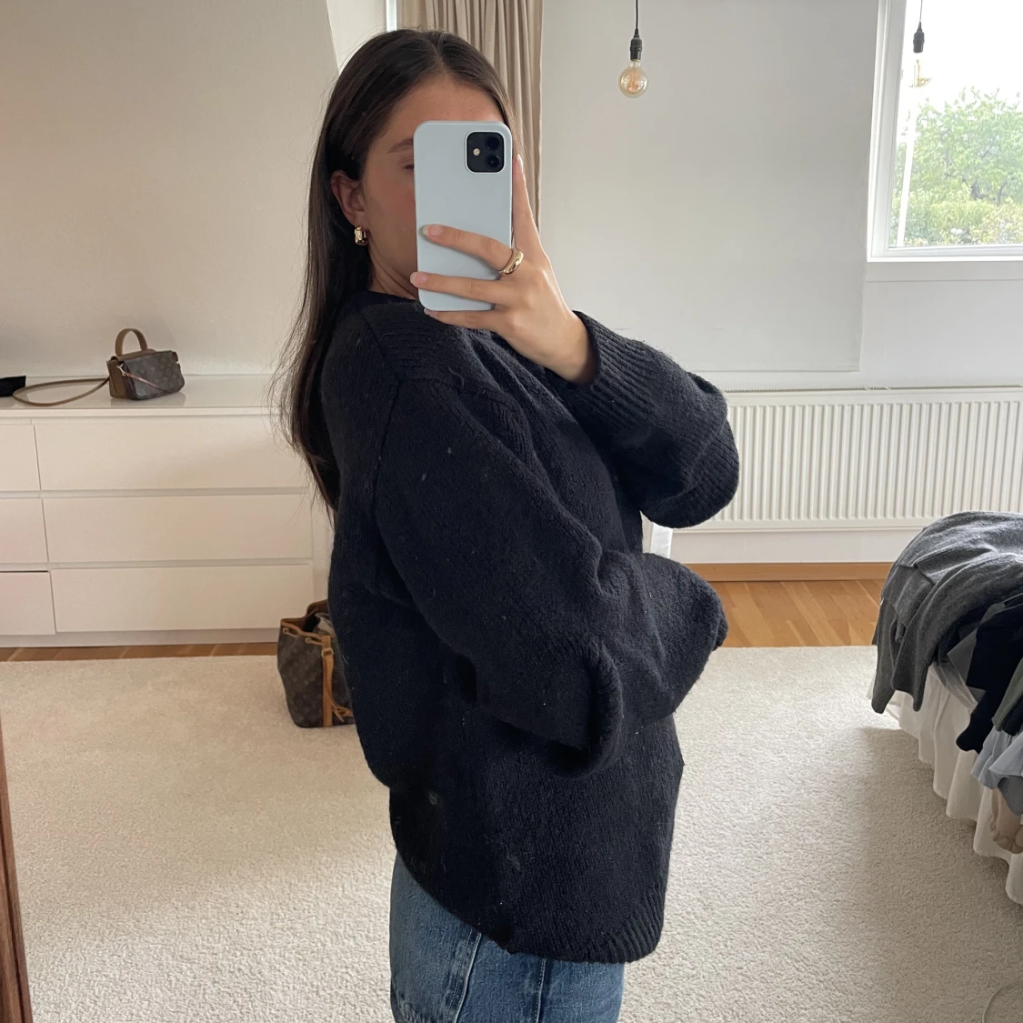 Svart stickad teöja - 91