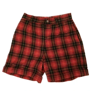 Högmidjade shorts rutiga - Balla högmidjade shorts i flanelliknande tyg. Köpta vintage men aldrig använda av mig, gott skick. Midjemått ca 70 cm. 