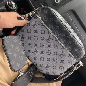 Louis Vuitton trioväska 