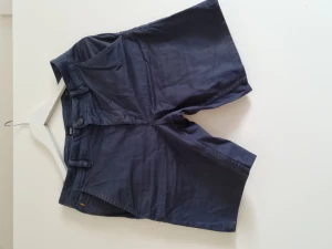 Shorts - Blåa hugo boss shorts, slim fit. Gott skick.