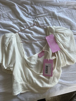 Bianca topp - Oanvänd topp, lappar kvar