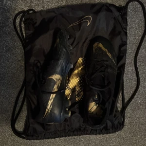 Fotbollsskor  - Nike Svart/guldiga mercurial vapor