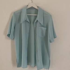 Vintage skjorta i superfin blå/grön. Vintage 