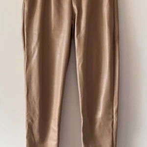 Byxor  - Skinnbyxor, aldrig använts, 