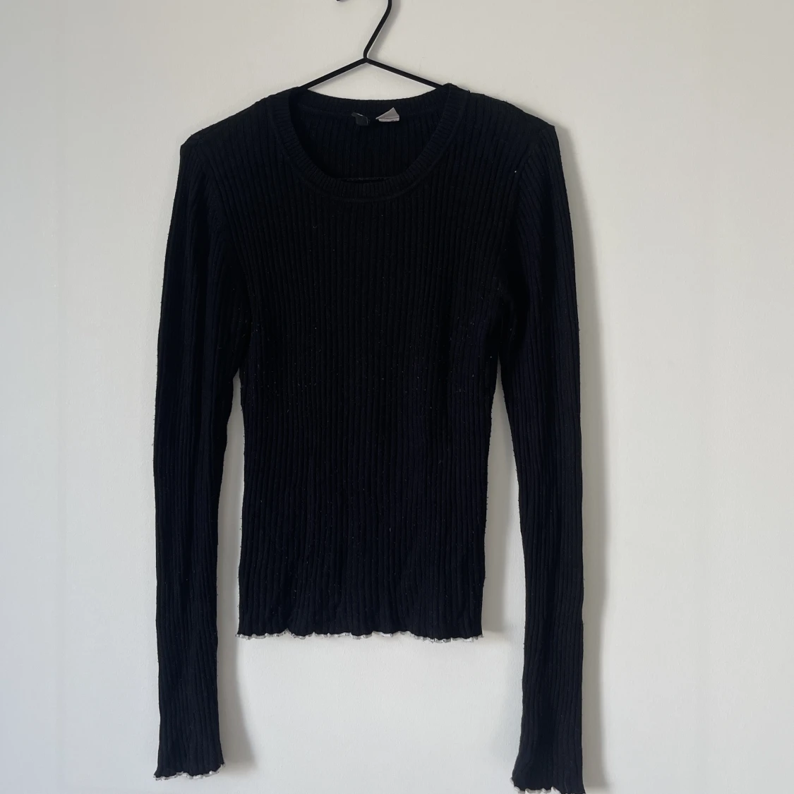 Svart stickad tröja