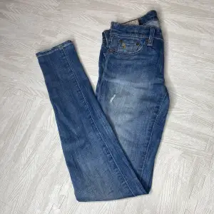 Skinny jeans i Stl 25 från Polo Ralph Lauren med låg midja 