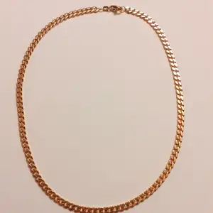 Halsband med guldduble i nyskick. Tjock kedja och 45 cm lång