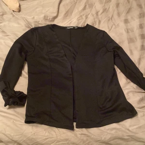 Svart kavaj - Svart kavaj