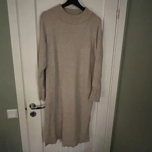 Stickad klänning  - Stxickad klänning