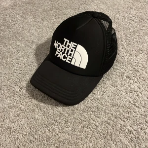 The North face keps - The north face keps Priset går att diskutera vid snabb affär