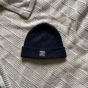 Morris mössa - Kanonfin mössa från Morris. Använd i ett par år men inga skador eller synliga tecken på att den är använd. 