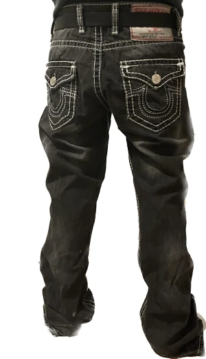 Svarta True Religion jeans 32/34 - Snyggt slitna True Religion jeans svart tvätt modell. Lös passform.