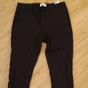 Svarta chinos  - Bra skick 