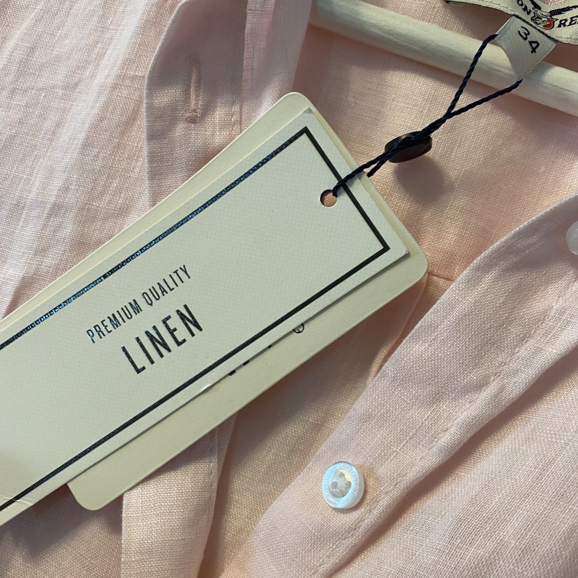 Rosa linneskjorta utan ärmar.  - 90