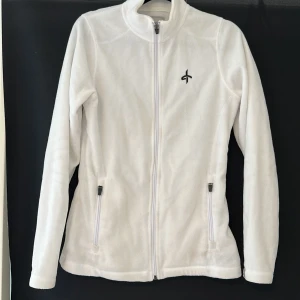 Cross sportwear fleece - Vit cross sportwear fleece.