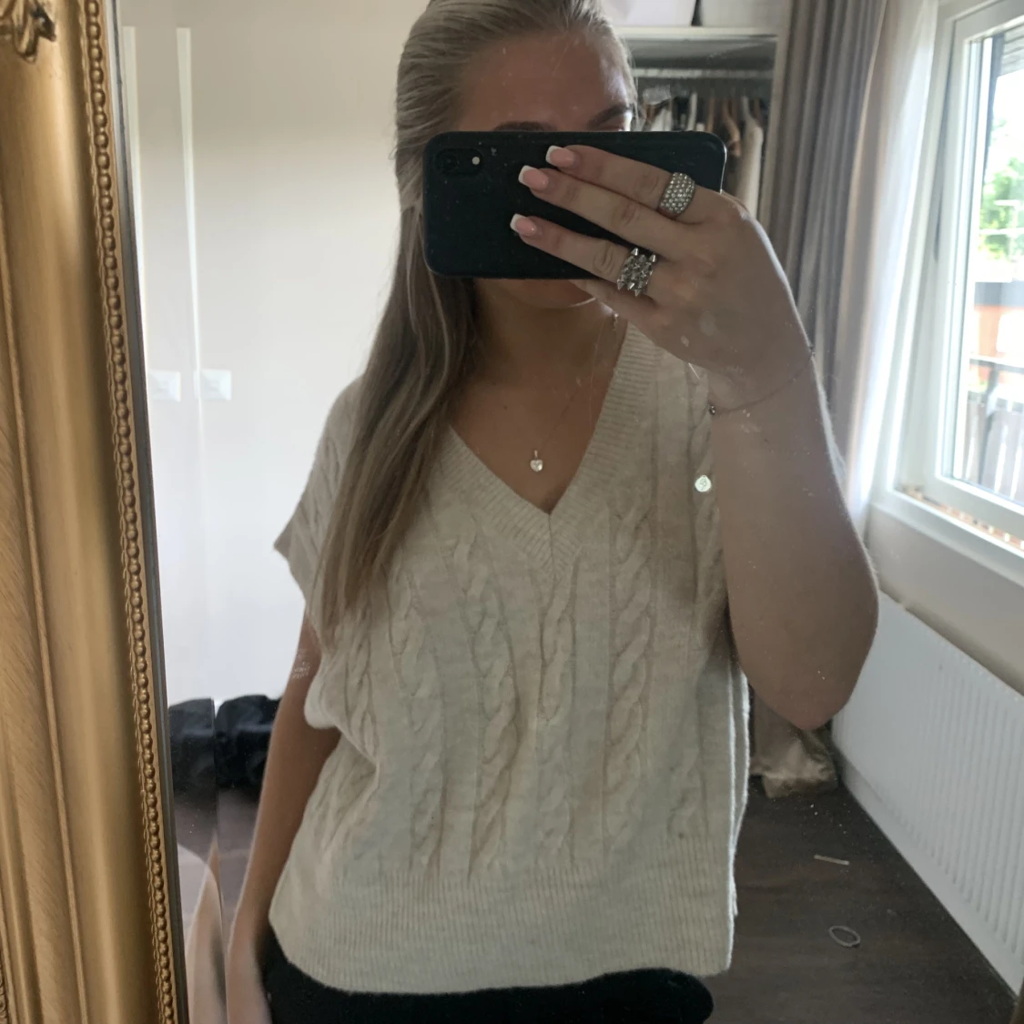 Stickad kortärmad tröja