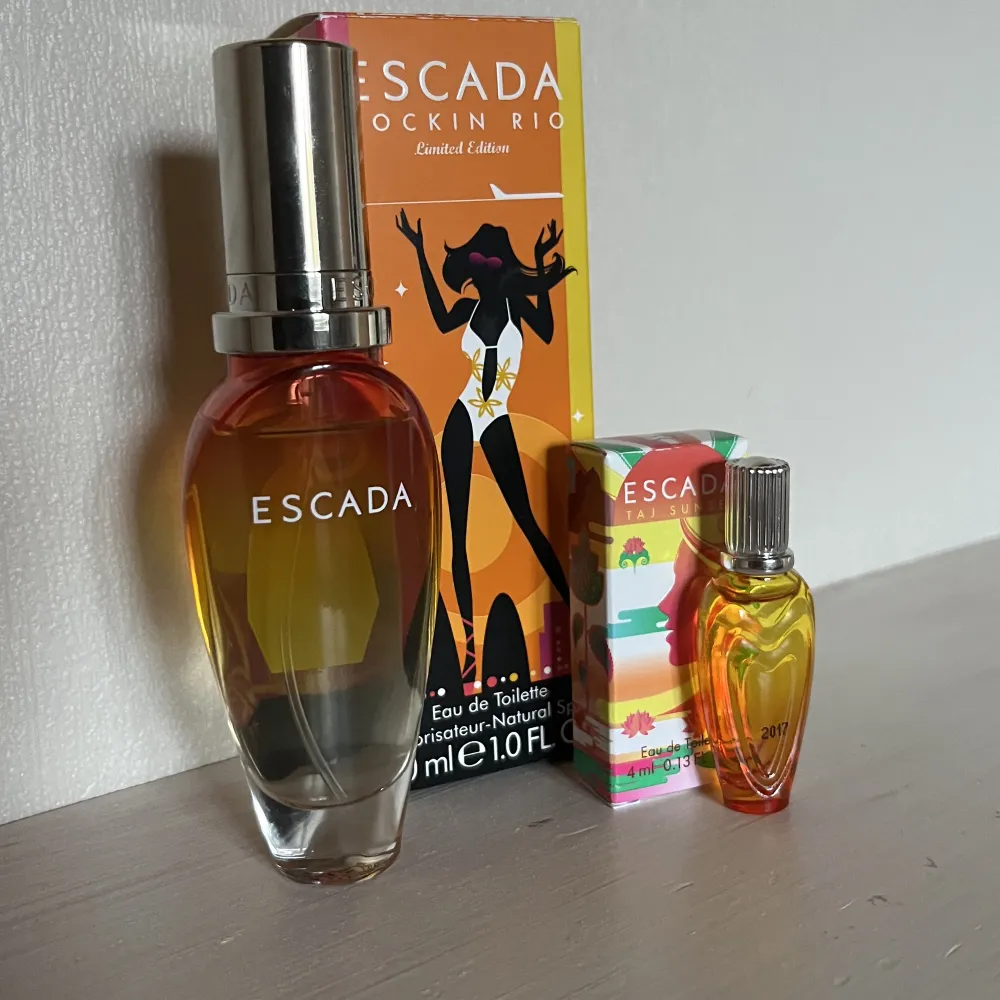 Escada, Rockin Rio, Limited Edition! Man får även med en mini av samma färg men olika lukter, den lilla är Taj Sunset i 4ml, aldrig använda, finns även inte att köpa längre därav priset.. Övrigt.