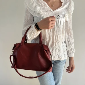 Röd väska - Röd väska från märket Raider. Fint skick, inga defekter.