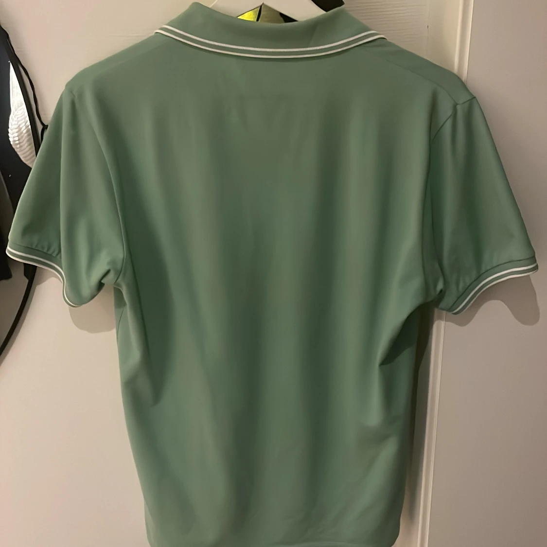 Grön pikétröja från Stone Island - 1